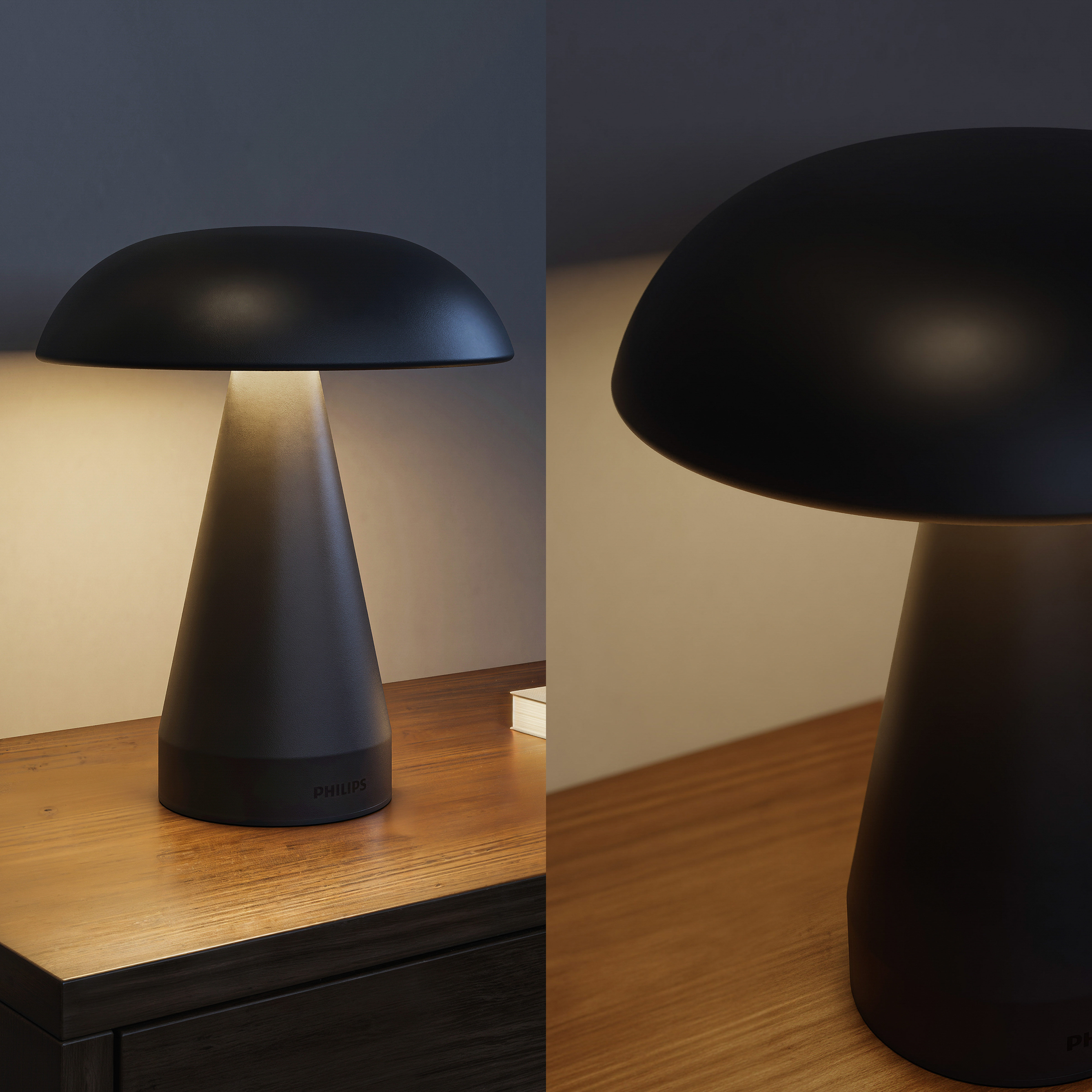 Een zwarte, moderne paddestoelvormige Philips-tafellamp gloeit zachtjes op een houten oppervlak tegen een donkere muur.