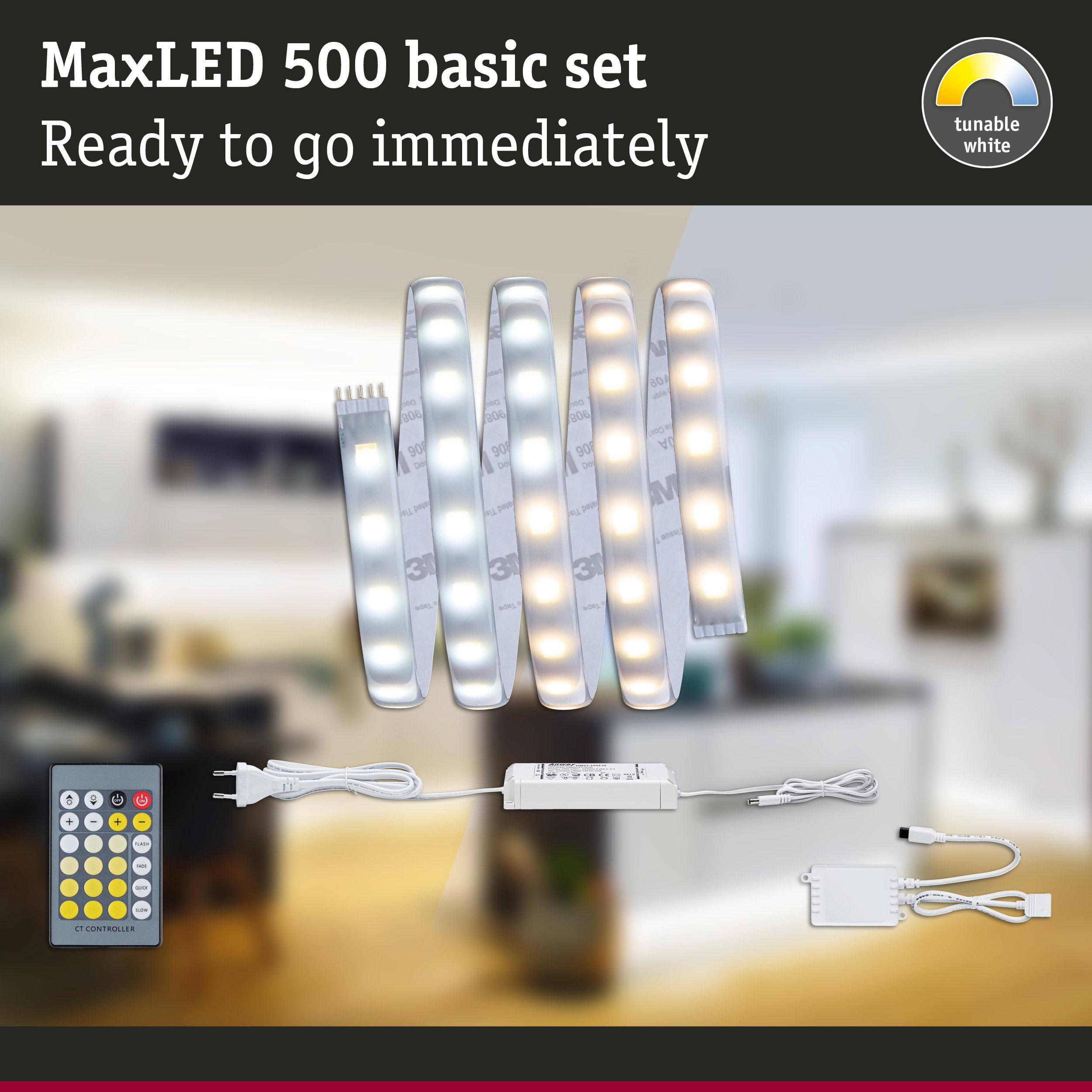 MaxLED 500 Basis-Set mit LED-Streifen, Netzteil, Controller und Fernbedienung vor verschwommenem Hintergrund.