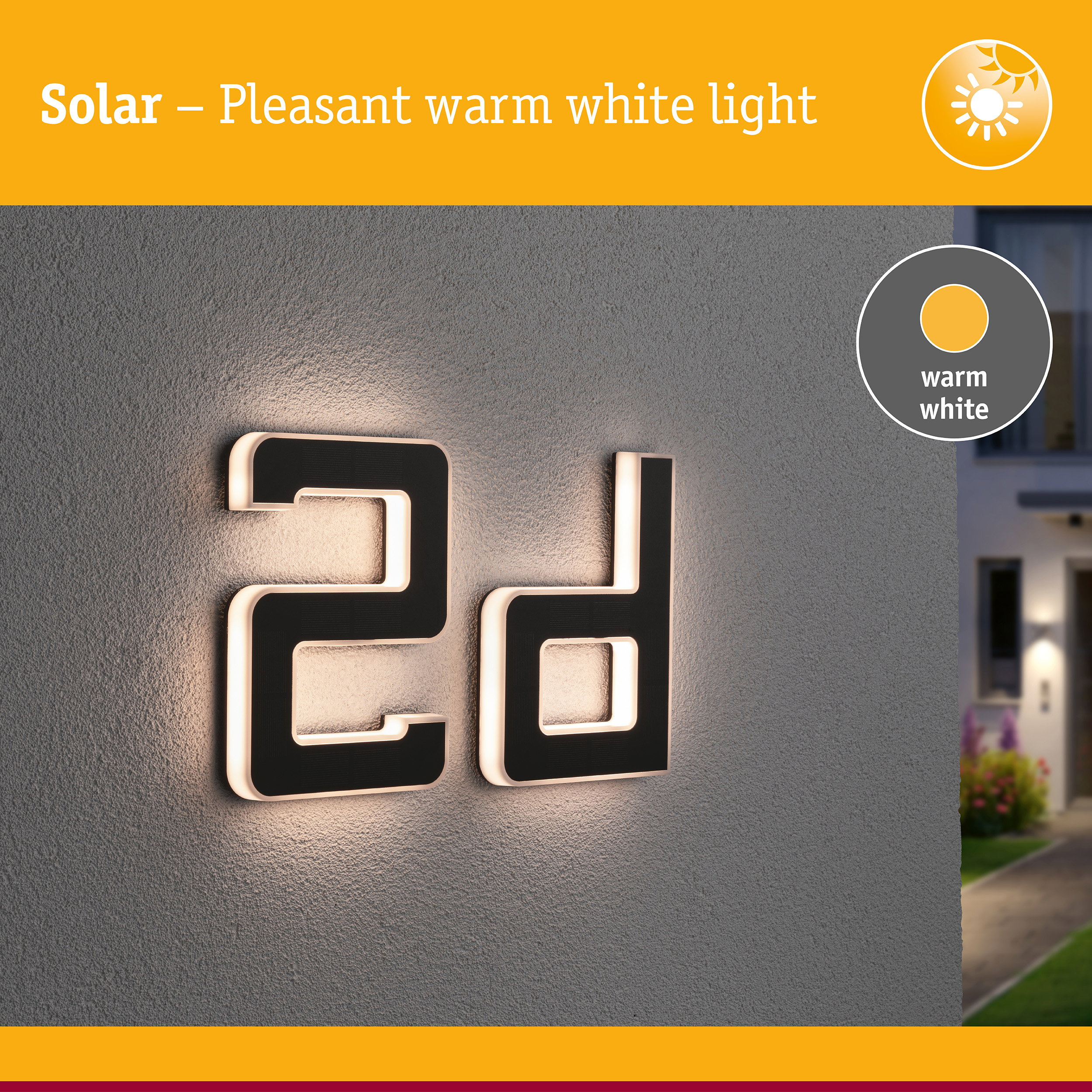 Solarbeleuchtete Hausnummer 2d mit warmweißem Licht an einer grauen Wand.