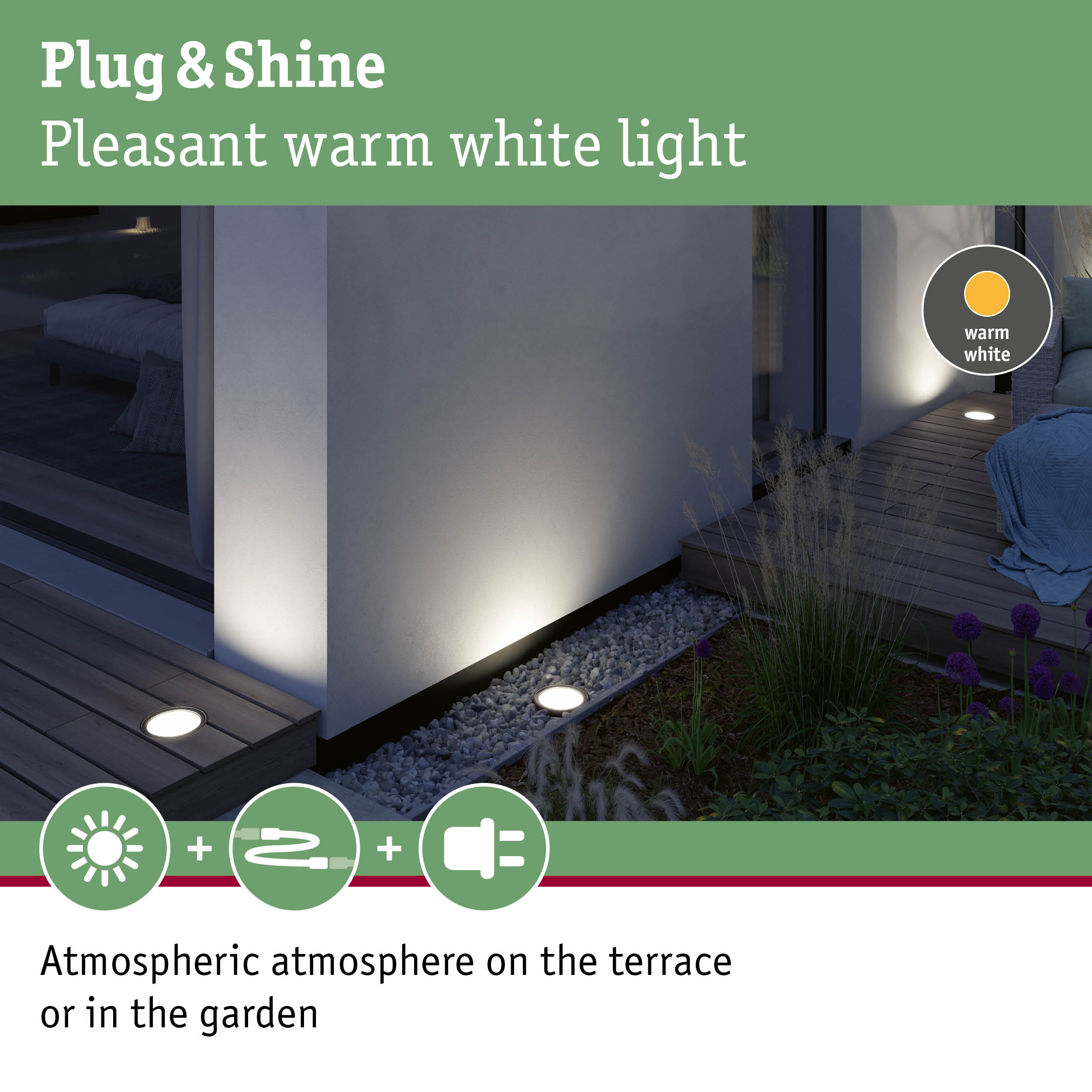 Eingelassene Bodenleuchten beleuchten eine Terrasse und ein Gartenbeet mit warmem Licht bei Dämmerung.