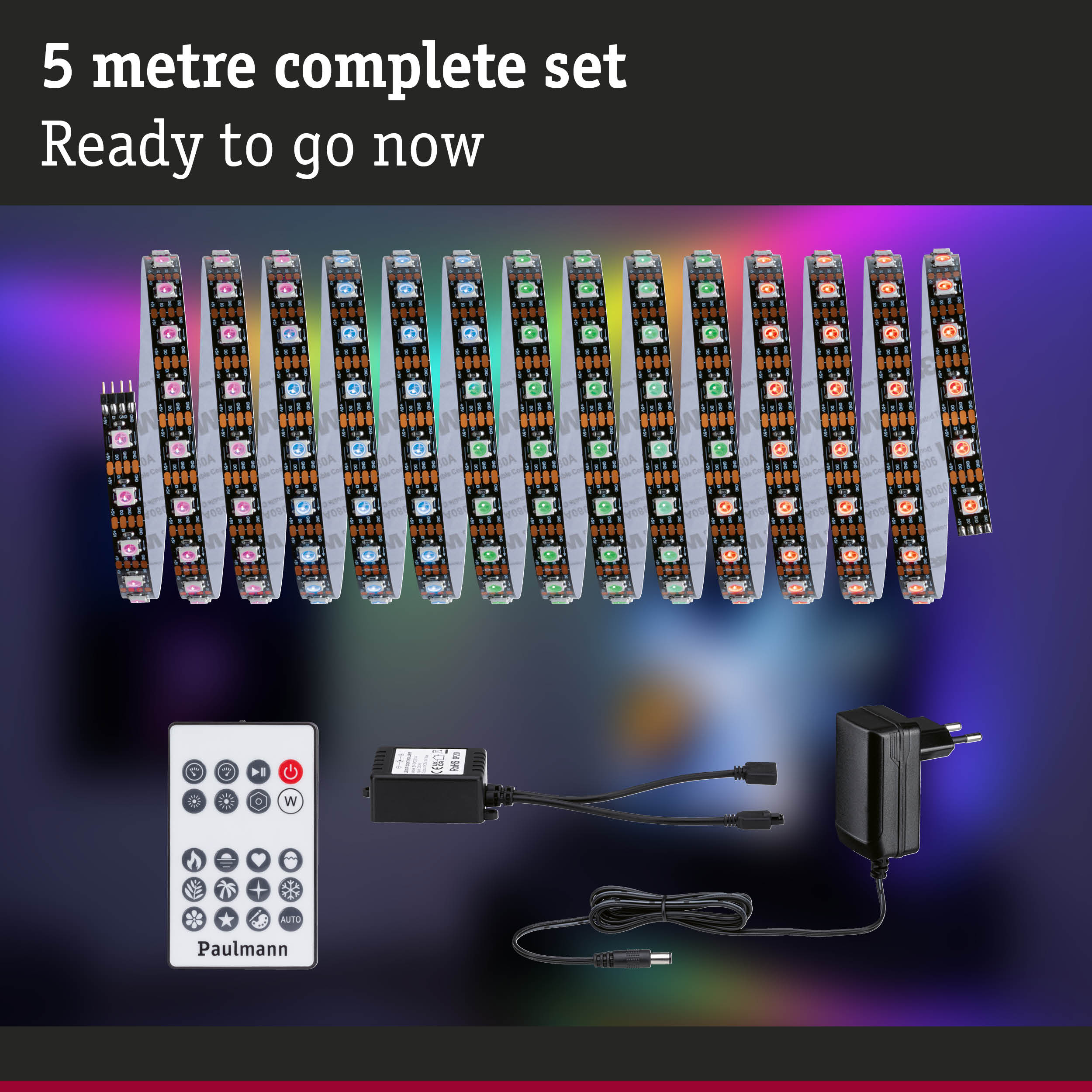 5 Meter LED-Streifen-Komplettset mit Fernbedienung, Controller und Netzteil vor buntem Hintergrund.