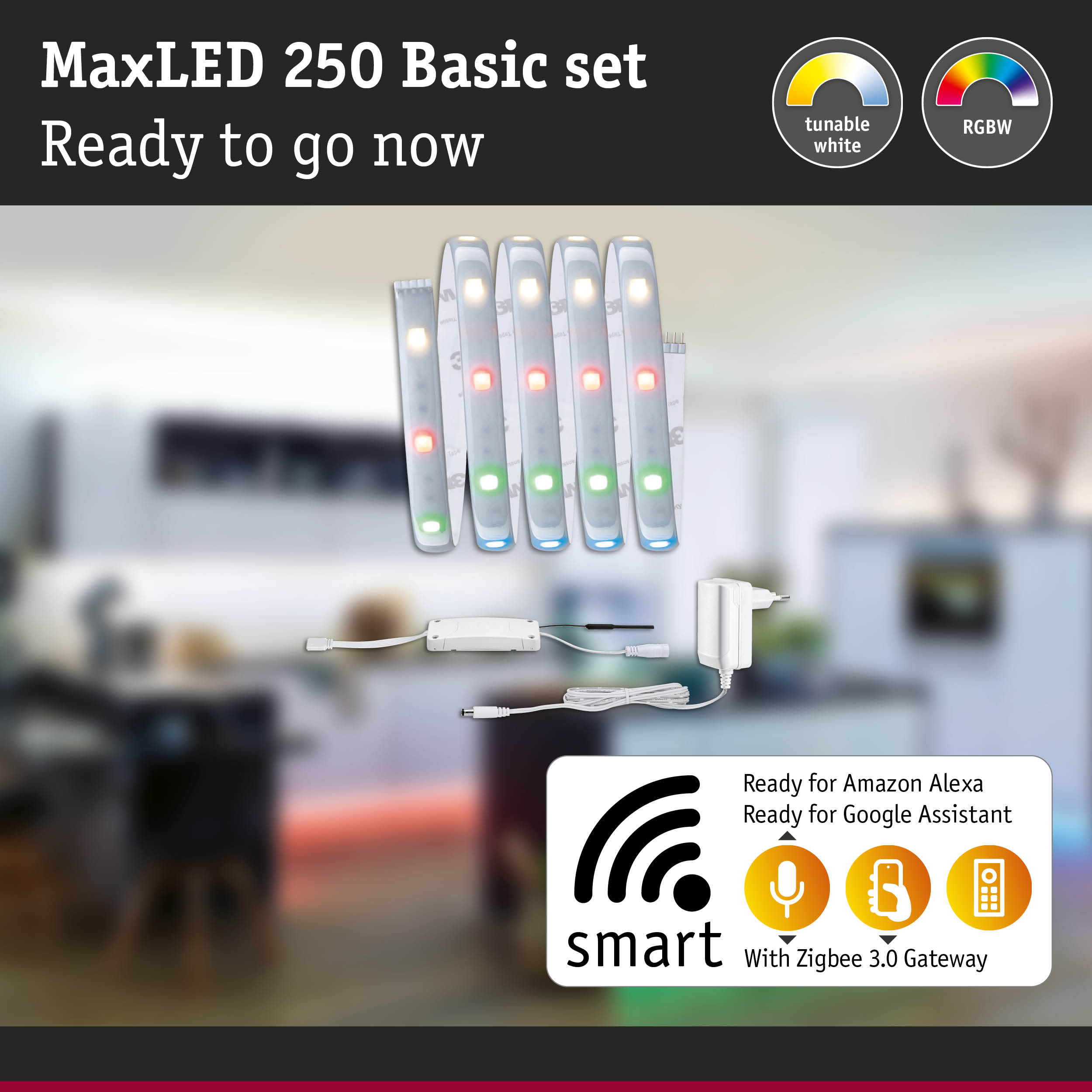 Zestaw podstawowy MaxLED 250 z taśmami LED, sterownikiem i zasilaczem na tle rozmytej kuchni.
