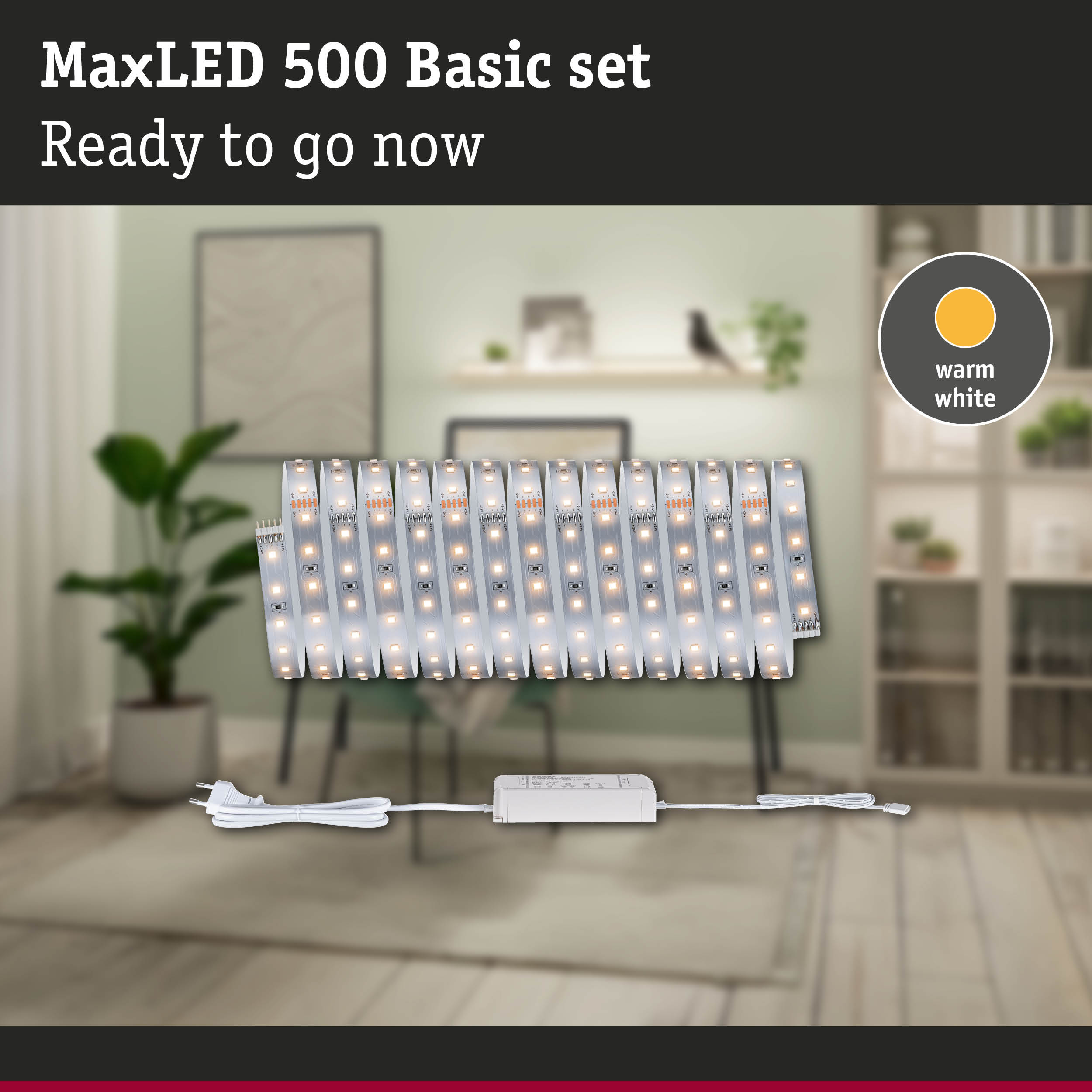 MaxLED 500 Basic Set warmweißes LED-Band mit Netzteil in einem Raum.