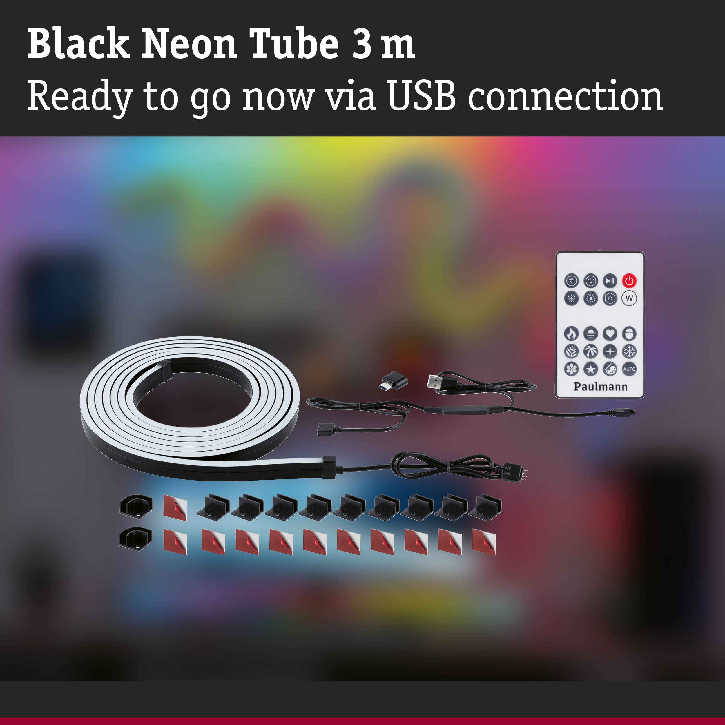 Eine aufgerollte schwarze Neonröhre, USB-Kabel, Fernbedienung und Halterungen vor buntem Hintergrund.