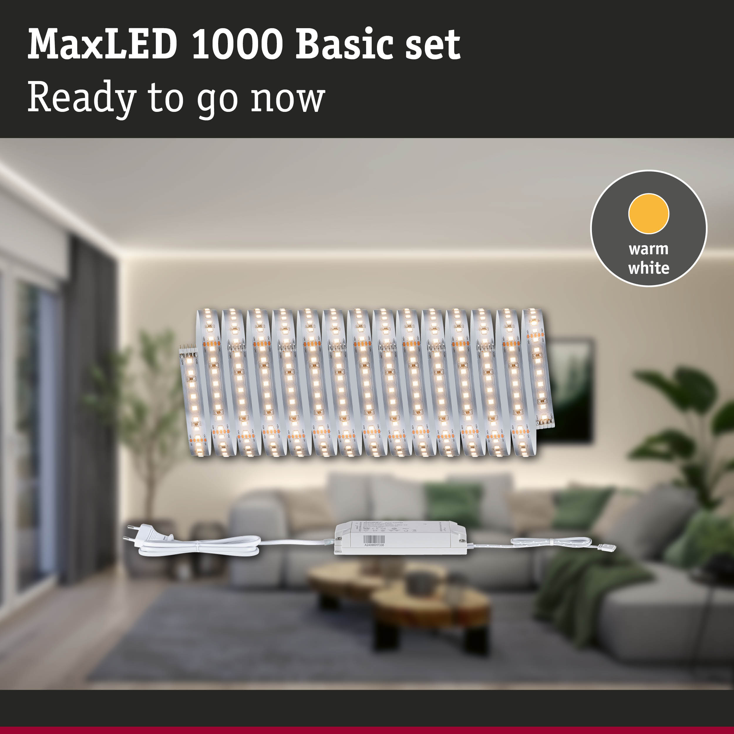 MaxLED 1000 Basis-Set gerollt mit warmweißem Licht, Netzkabel und Treiber im Wohnzimmer.