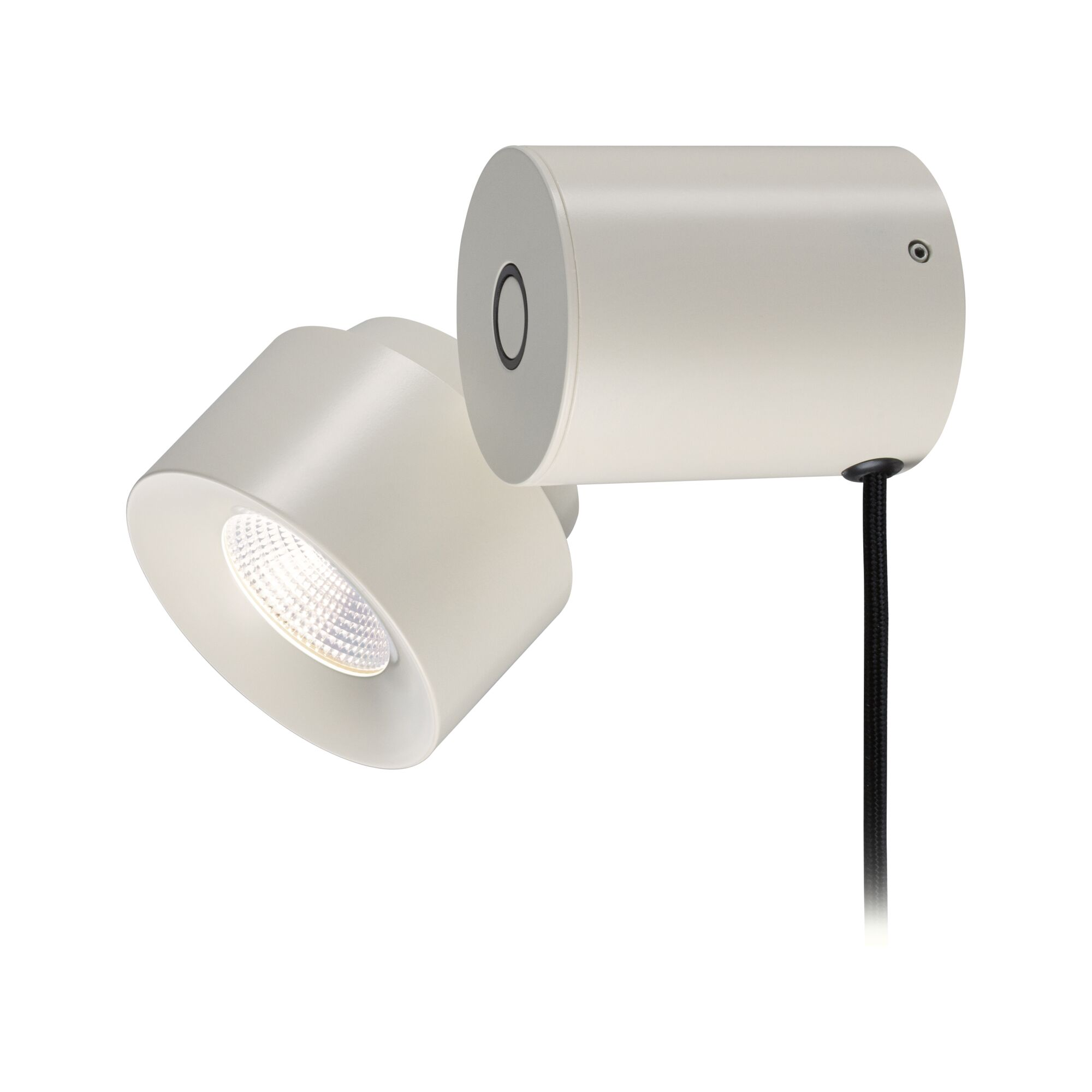 Ein moderner, cremeweisser zylindrischer Strahler mit schwarzem Kabel und leuchtender LED-Fläche vor weissem Hintergrund.