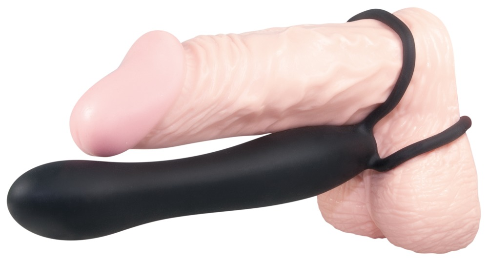 Ein rosafarbenes realistisches Sextoy mit einem schwarzen Aufsatz und Ringen auf weißem Hintergrund.