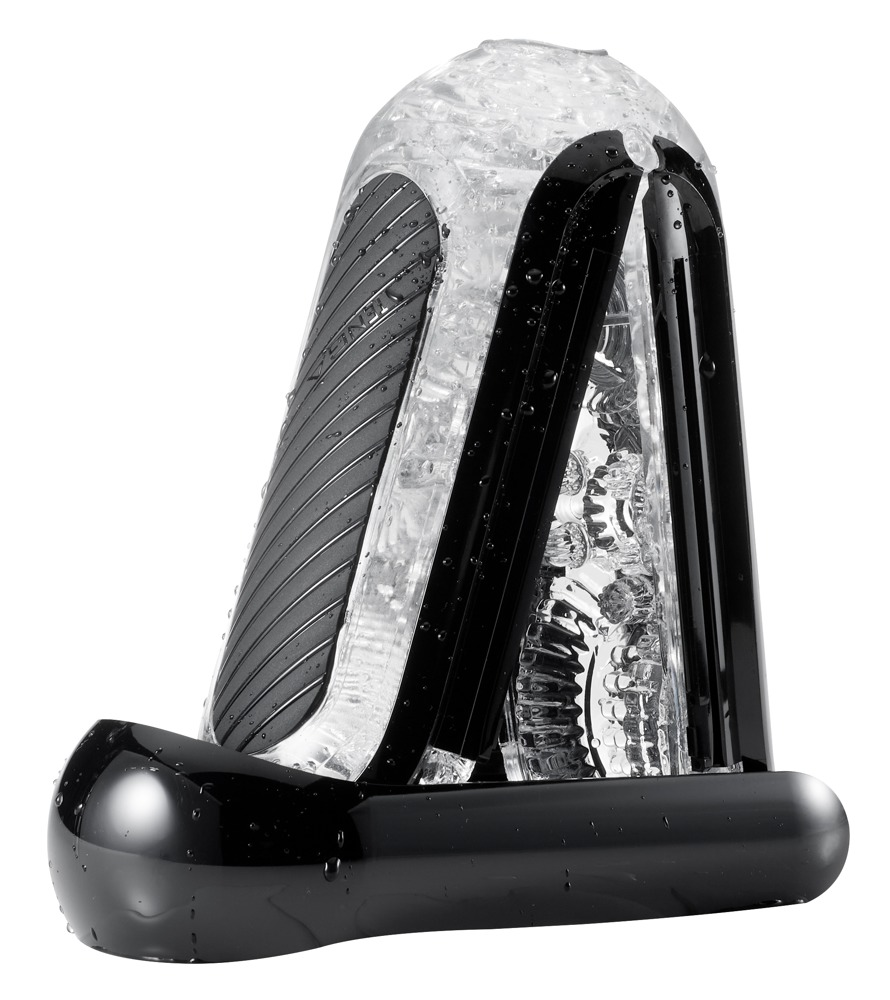 Ein schwarzes und transparentes Wellness-Gerät auf einer Basis mit Wassertropfen auf der Oberfläche.