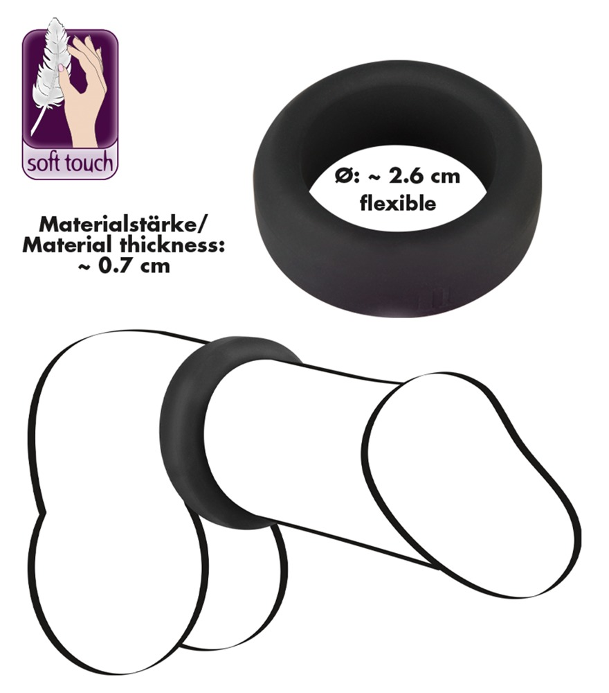 Schwarzer, flexibler Cockring mit 2,6 cm Durchmesser und 0,7 cm Dicke, illustriert mit Maßangaben.