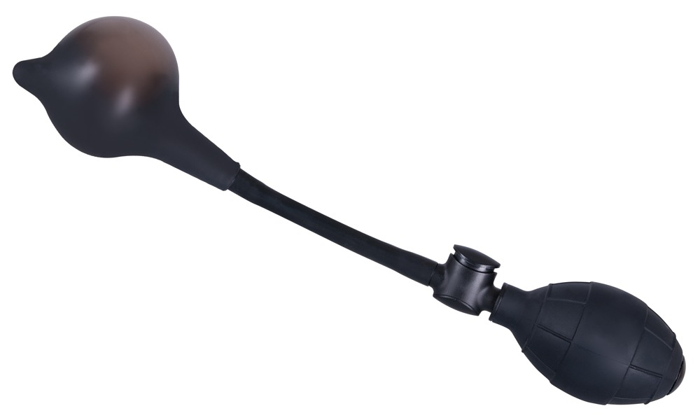 Ein schwarzes medizinisches Gerät mit einer runden Pumpe, einem Schlauch und einem Aufsatz auf weißem Hintergrund.