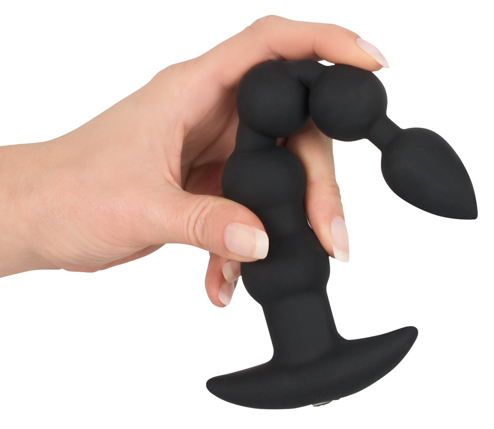 Eine Hand hält ein schwarzes Silikon-Analspielzeug mit Perlenkette und Basis.