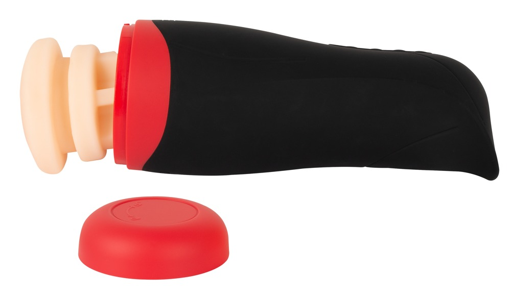 Ein rot-schwarzes erotisches Toy mit beigem Einsatz und separatem roten Deckel auf weißem Grund.