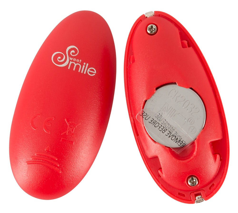 Zwei rote, ovale Geräte; eines mit Logo, das andere geöffnet mit CR2032-Batterie und Schrauben.