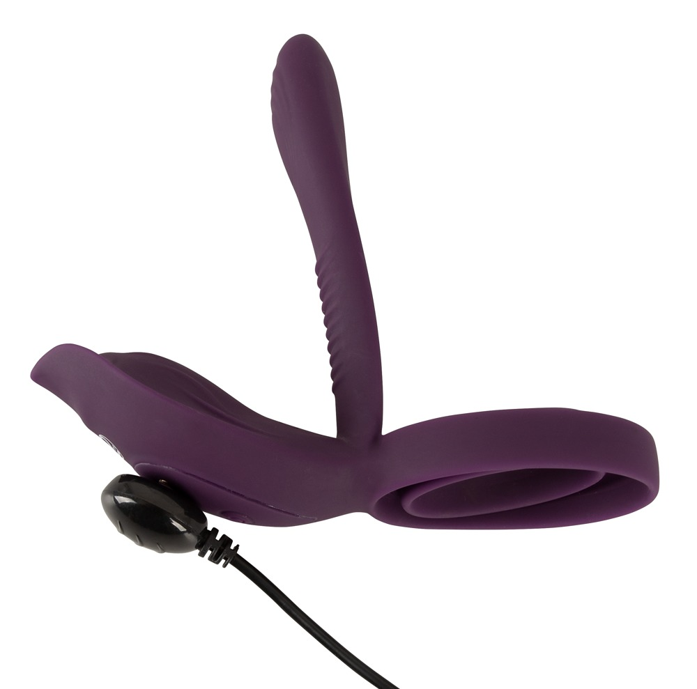Ein lila Silikonvibrator mit einem schwarzen Netzkabel gegen einen weißen Hintergrund.