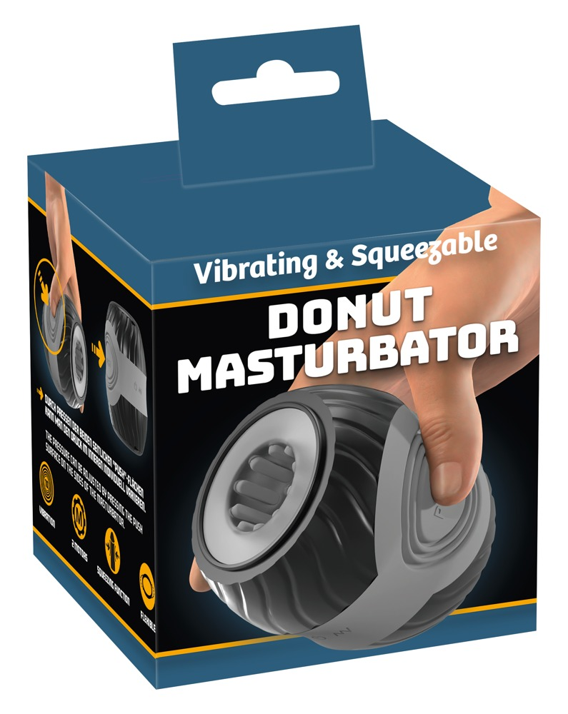 Blaue Verpackung für einen runden, grauen Donut-Masturbator, der von einer Hand gehalten wird.
