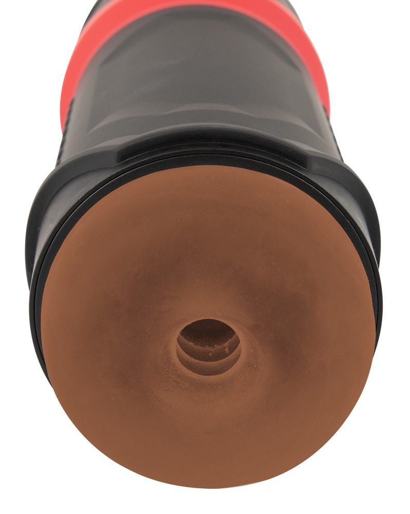Ein zylindrisches, schwarzes und rotes Gerät mit einer braunen, strukturierten Öffnung an einem Ende auf weißem Hintergrund.
