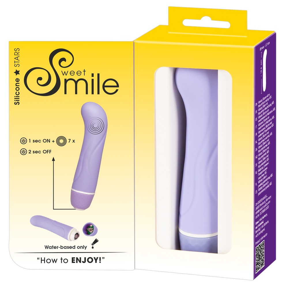 Ein lila Silikonvibrator in gelb-lila Verpackung mit Anleitung und Produktmerkmalen.