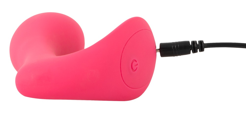 Ein pinkes, ergonomisches Silikongerät mit Ein/Aus-Schalter, verbunden mit einem schwarzen Ladekabel auf weißem Grund.