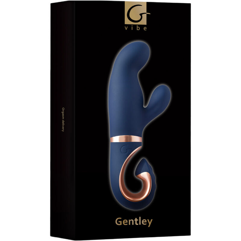 Caja de vibrador G-Vibe Gentley azul y dorada sobre fondo negro.