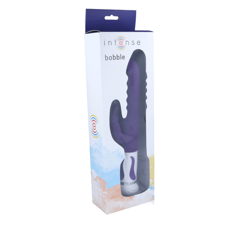 Eine weiße und blaue Box mit einem lila Massagegerät namens intense bobble.