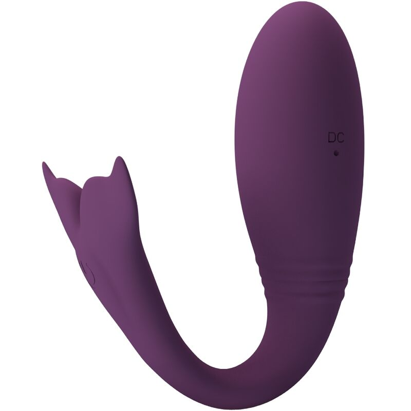 Un producto de bienestar de silicona morado y en forma de U sobre un fondo blanco.