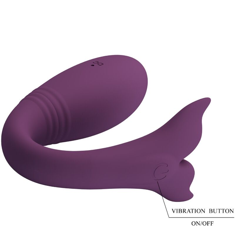 Vibrador morado y curvado en forma de ballena con botón de encendido sobre fondo blanco.