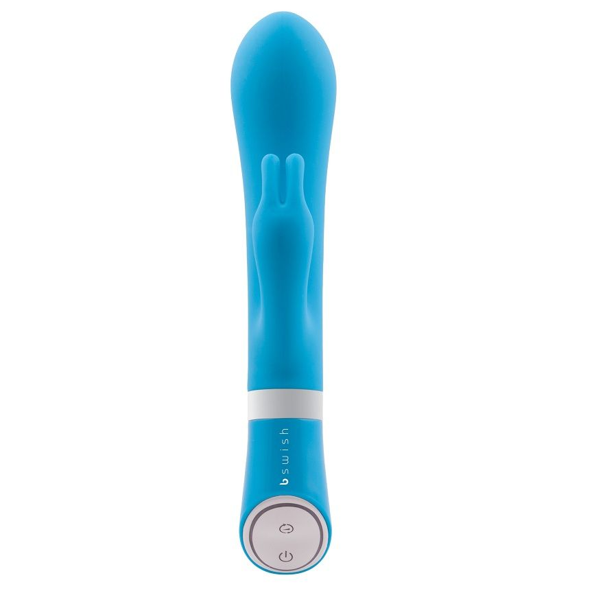 Un vibrador de bienestar azul y liso con una línea de acento blanca y dos botones de encendido sobre fondo blanco.