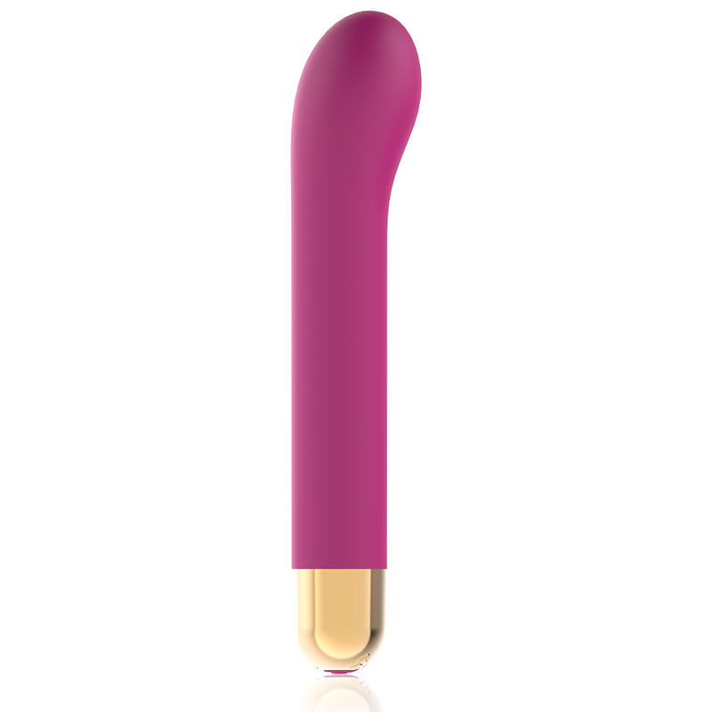 Un vibrador rosa ligeramente curvado con base dorada sobre fondo blanco.
