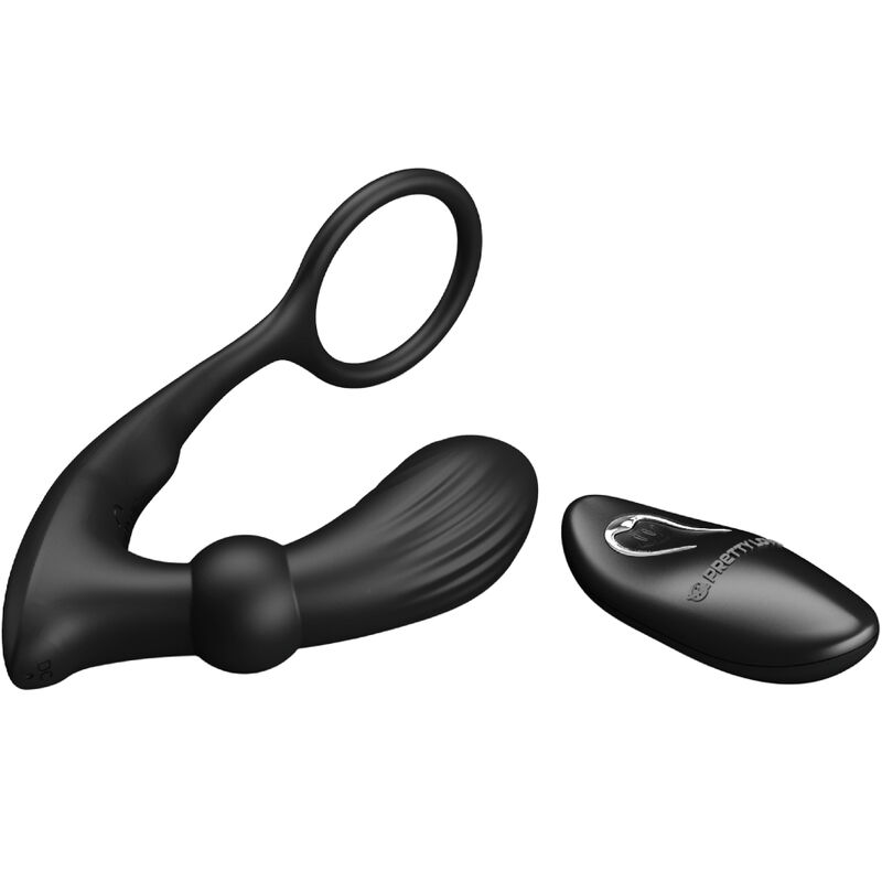 Juguete sexual de silicona negra con anillo y control remoto separado.