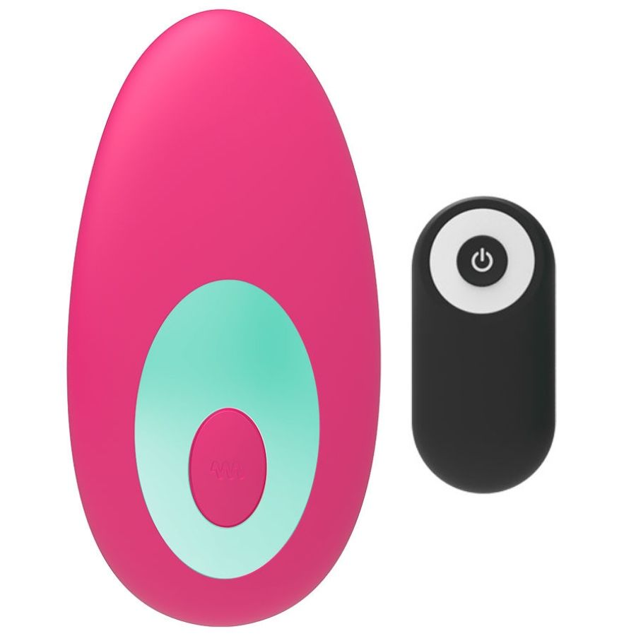 Un dispositivo grande en forma de huevo rosa con un botón azul claro y rosa, y un pequeño control remoto negro al lado.