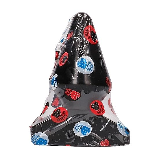 Ein kegelförmiger, schwarzer Gegenstand ist in bedruckte Plastikfolie mit roten und blauen Aufklebern eingewickelt.