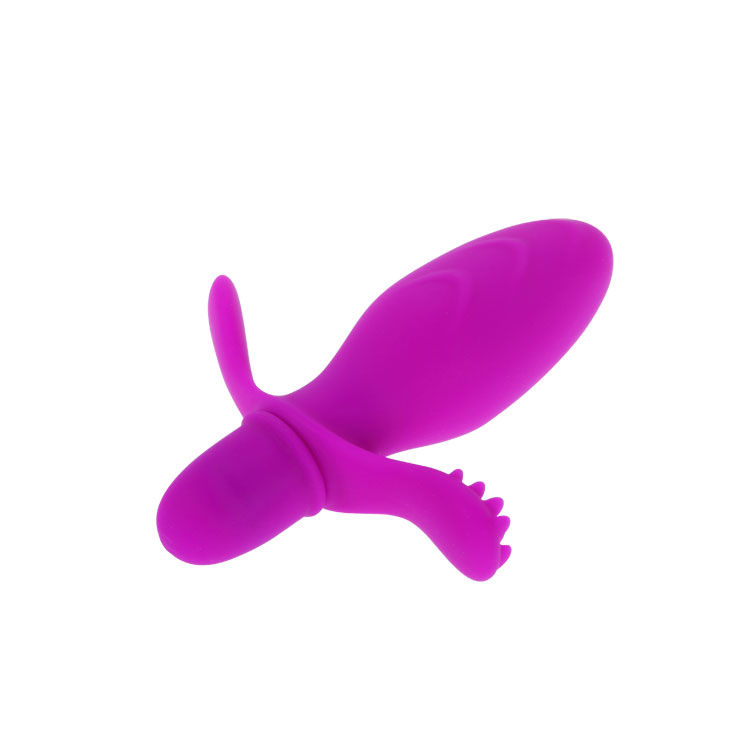 Ein rosafarbenes, ergonomisch geformtes Wellnessprodukt mit glatter Oberfläche vor weißem Hintergrund.