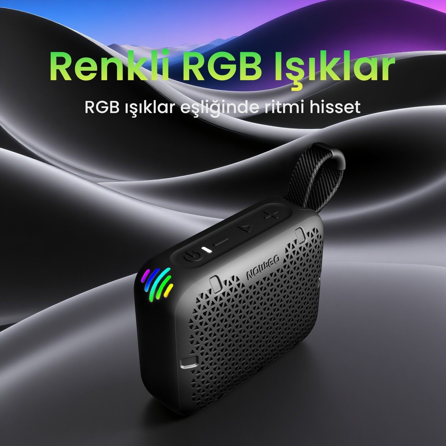 Czarny głośnik przenośny z oświetleniem RGB na falistym szarym tle, z tureckim tekstem promocyjnym.