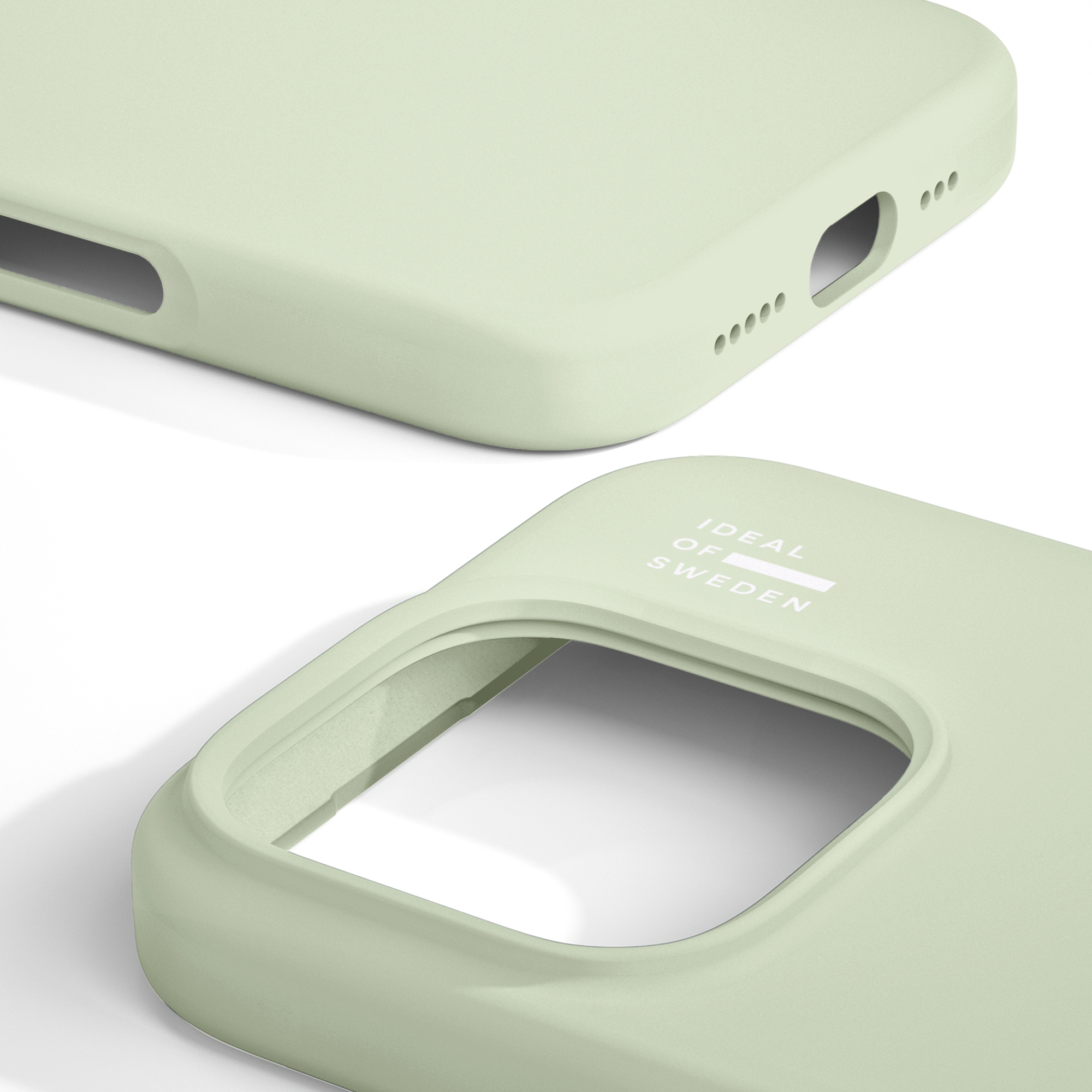 Two light green Ideal of Sweden phone cases on a white background, highlighting camera cutout and ports.