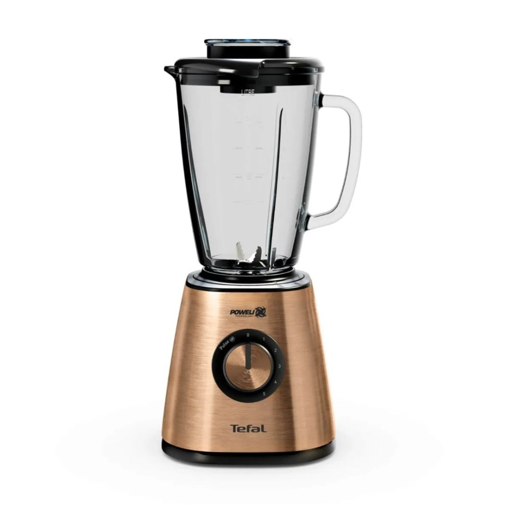 Nowoczesny blender z różowozłotą podstawą, szklanym dzbankiem, czarną pokrywką i pokrętłem na białym tle.
