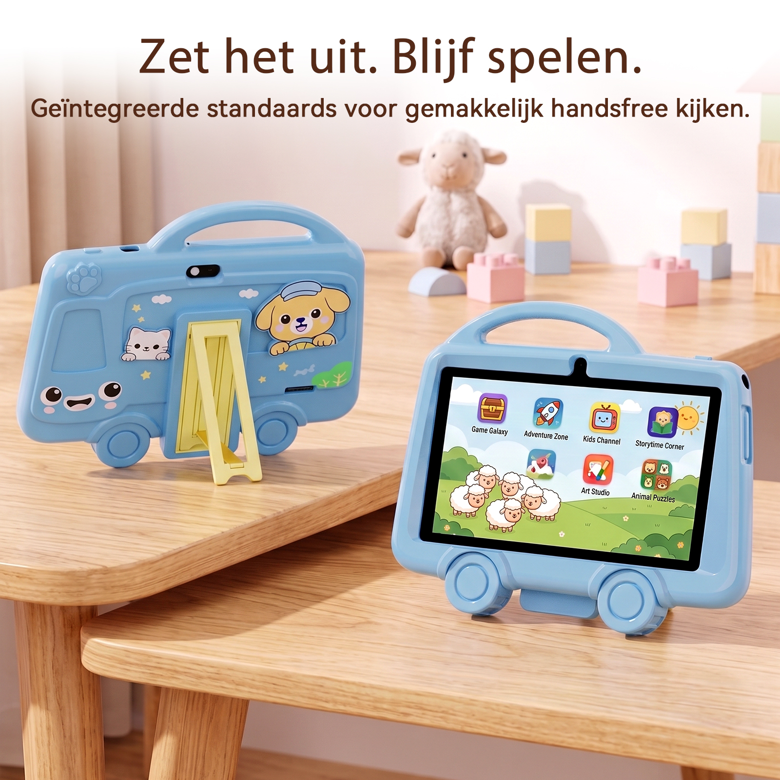 Two blue bus-shaped tablet cases with built-in stands on a wooden desk, surrounded by toys.
