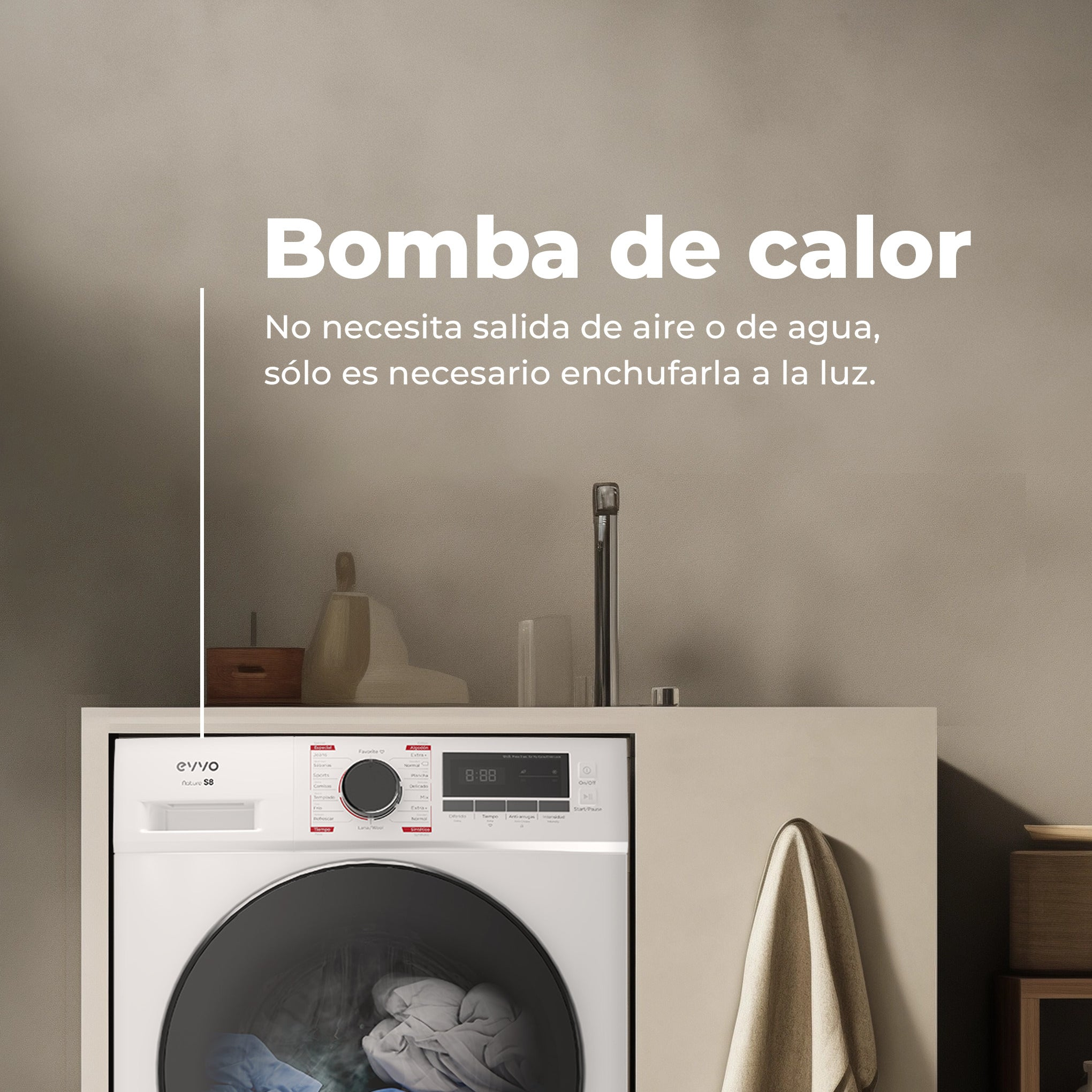 Lavadora con bomba de calor blanca y texto en español, bajo un mostrador con grifo y toalla.