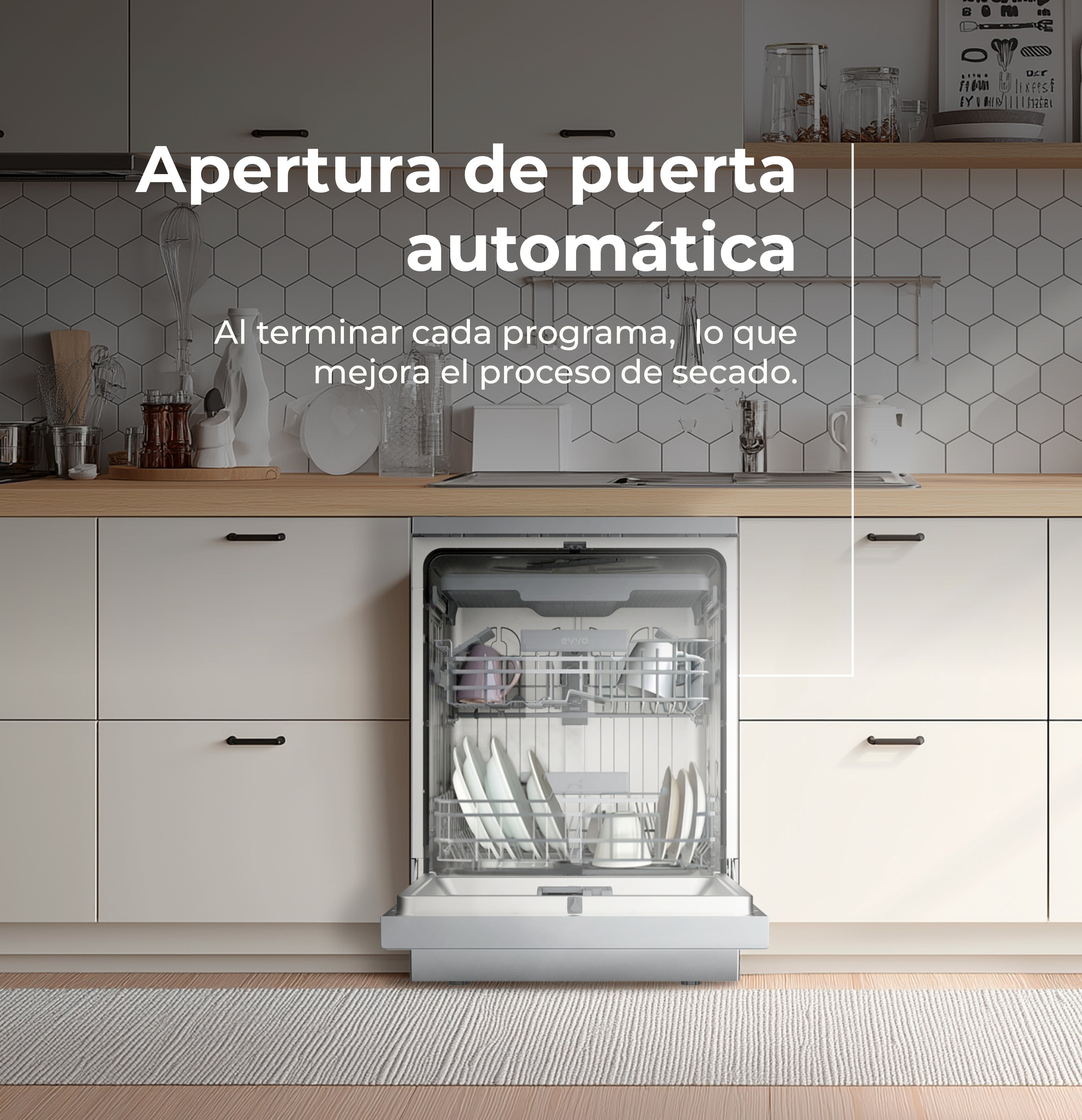 Lavavajillas plateado abierto con platos en una cocina moderna con muebles blancos y azulejos hexagonales.