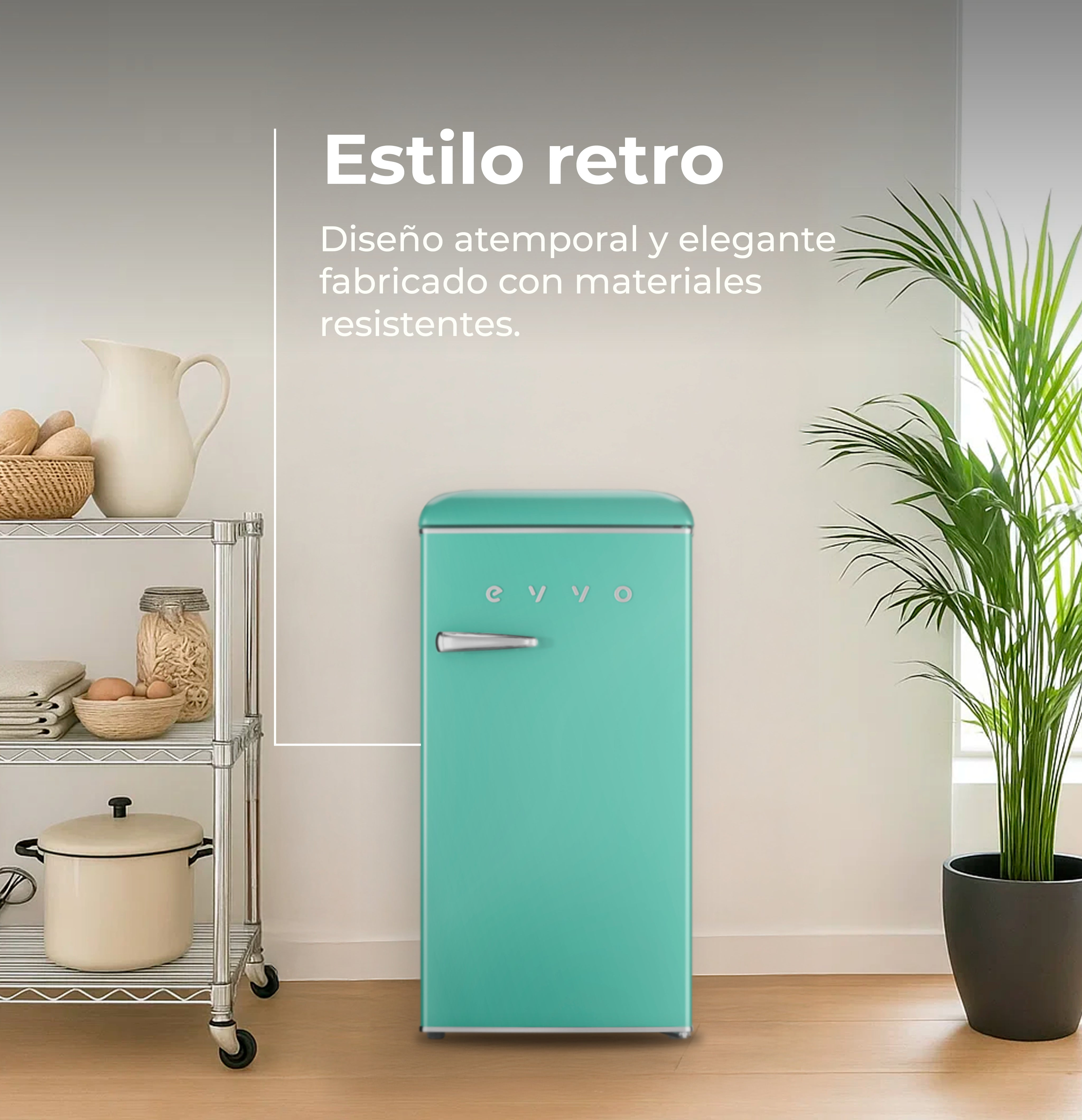 Una nevera retro turquesa en una cocina luminosa junto a una estantería metálica y una planta.