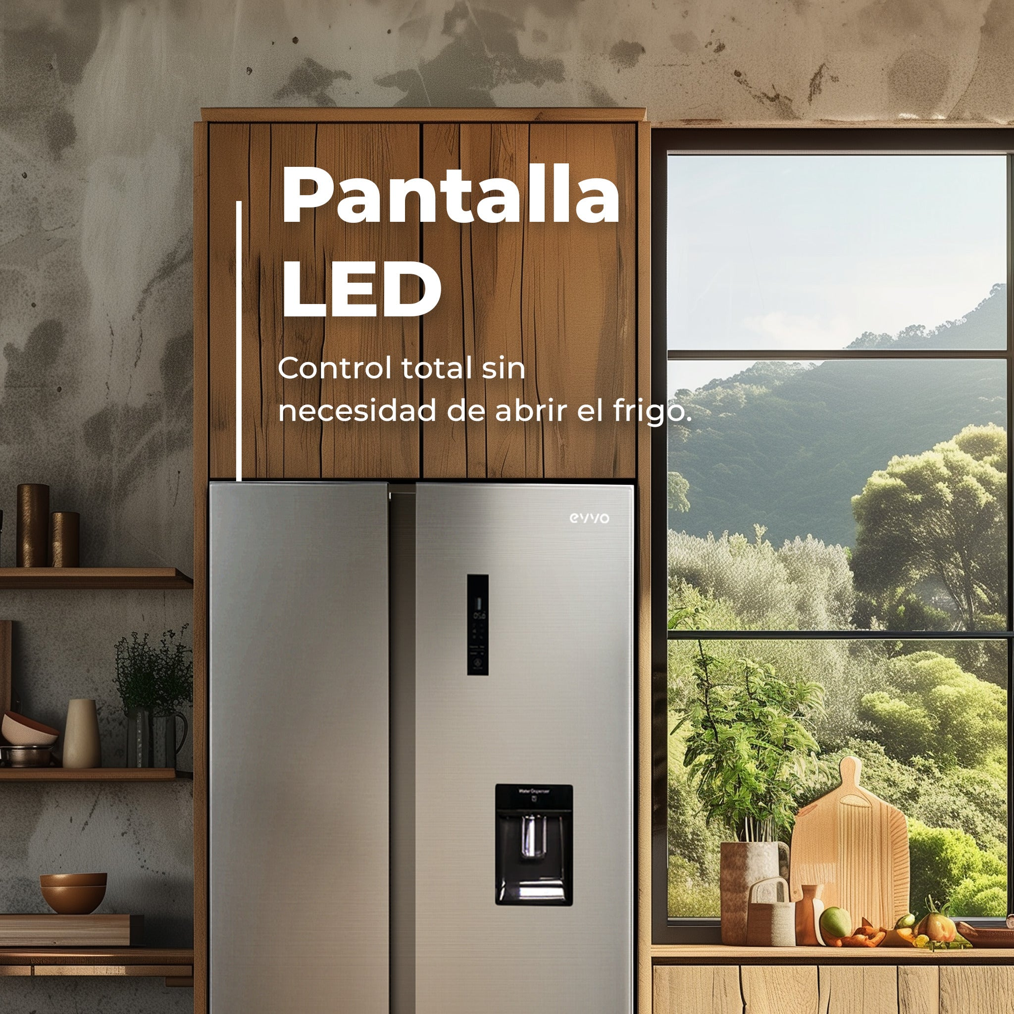 Una nevera plateada en una cocina de madera, junto a una ventana con vistas a colinas verdes.