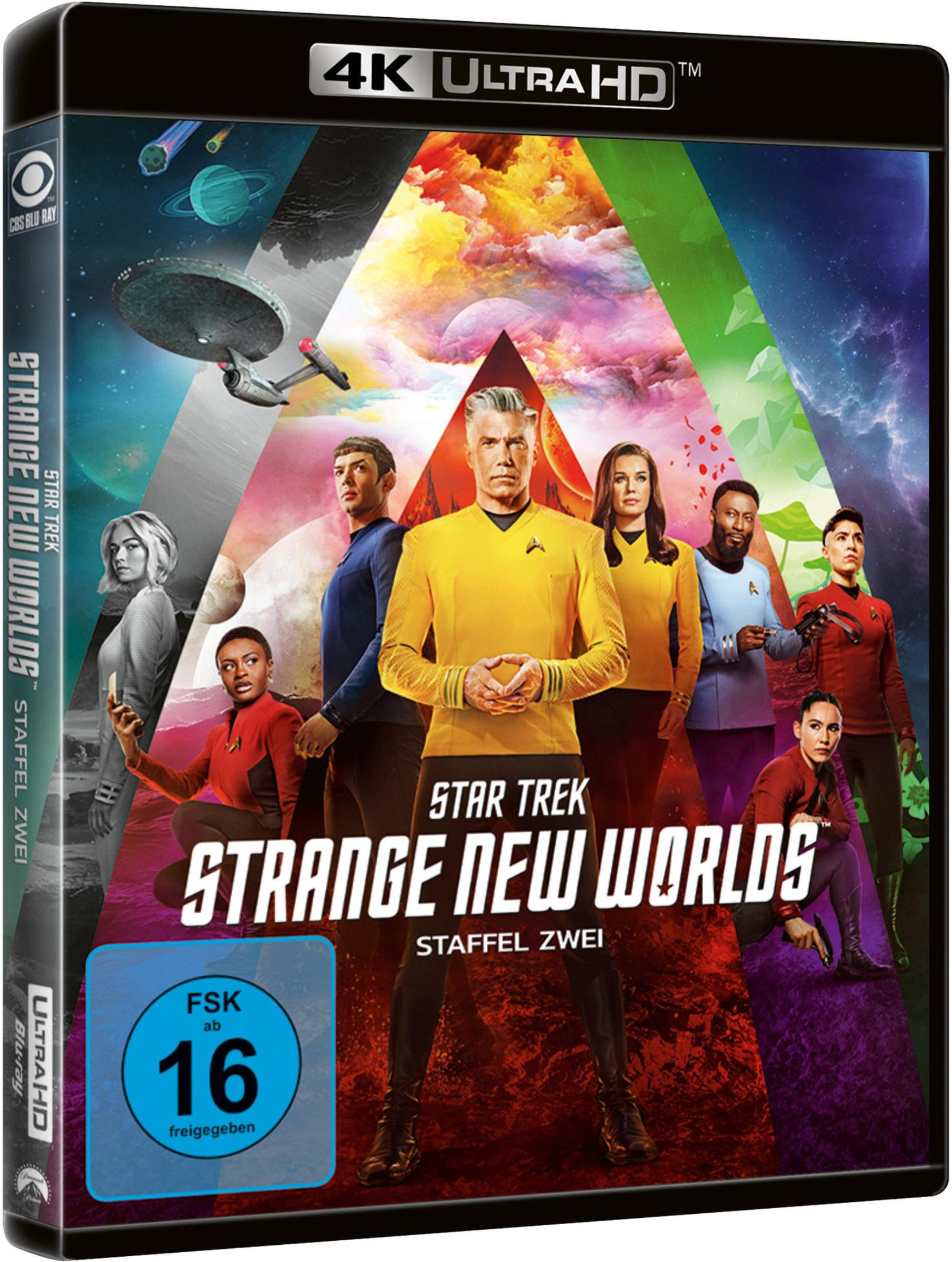 Star Trek Strange New Worlds Staffel 2 Blu-ray Cover mit Crew vor bunten Planeten.