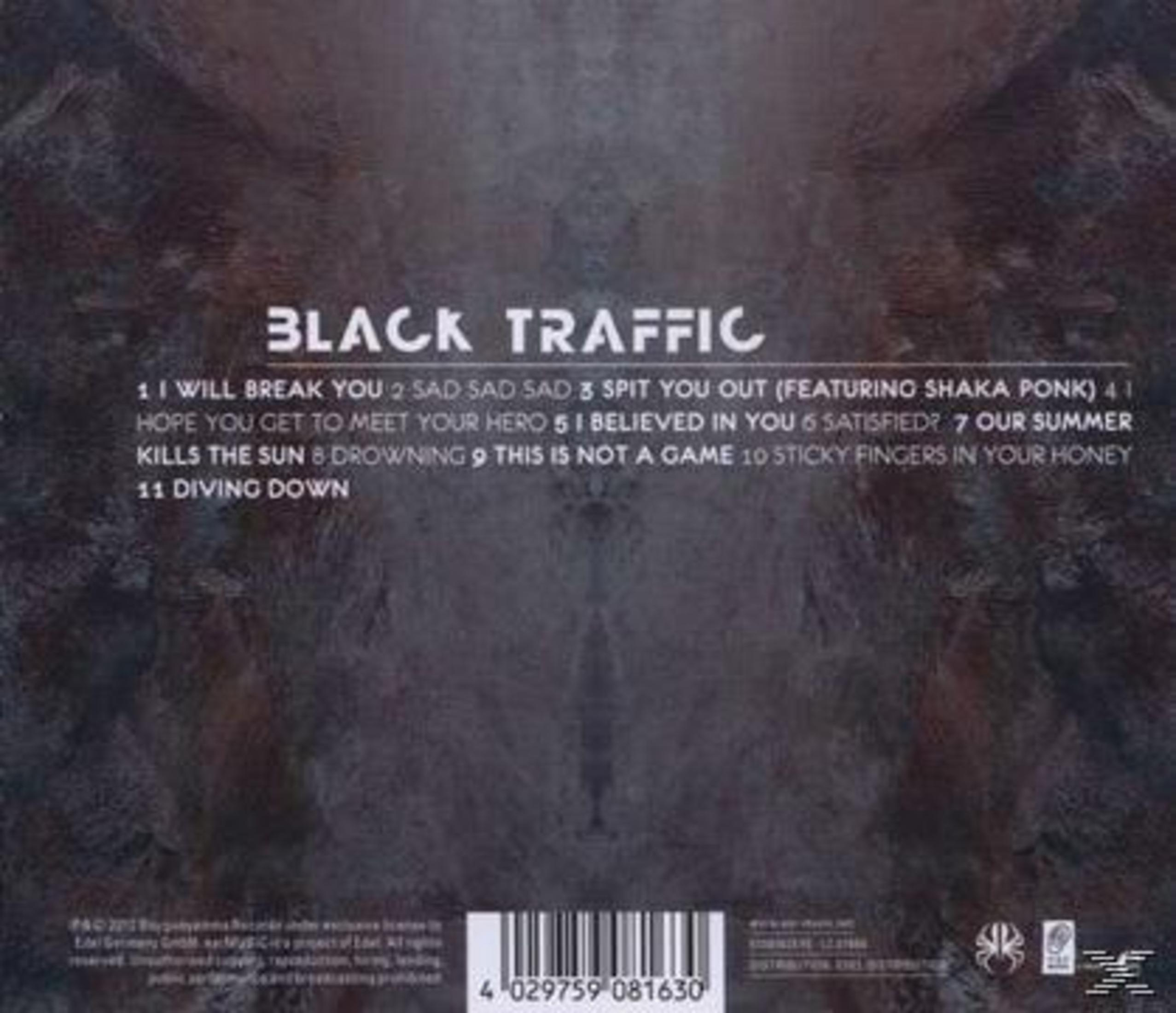 Rückseite des Albums Black Traffic mit Trackliste vor dunklem, gemustertem Hintergrund.