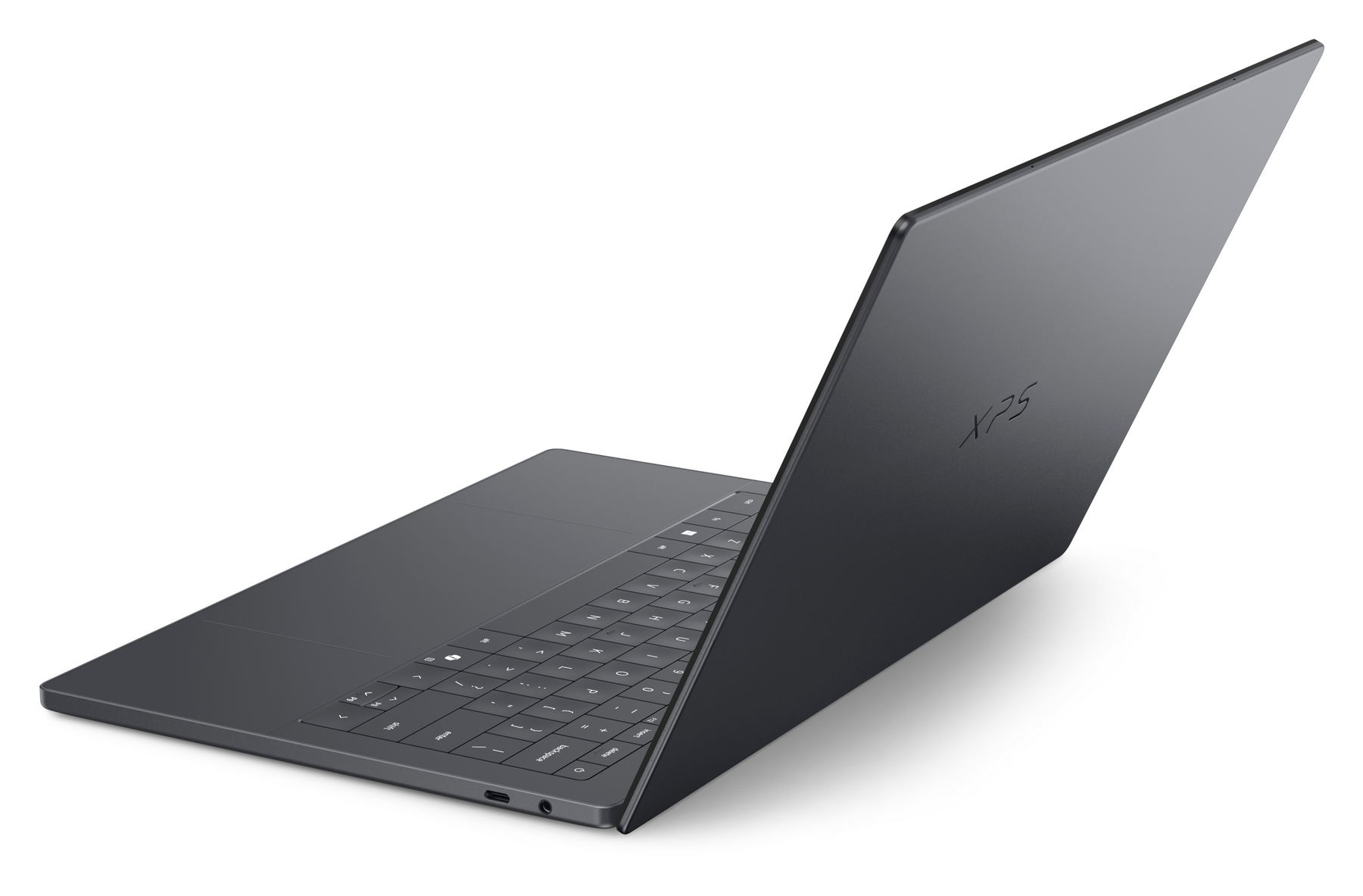Un elegante laptop grigio scuro visto da dietro e di lato, con tastiera e logo XPS.