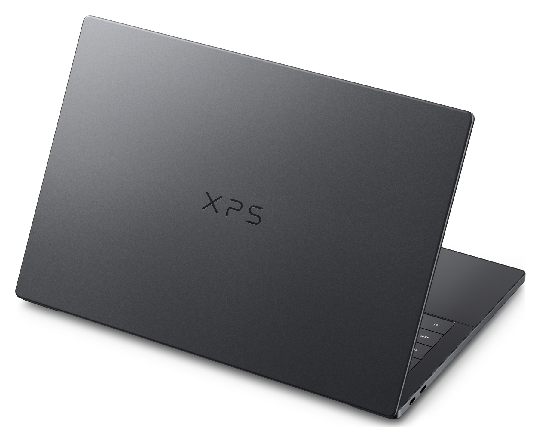 Un computer portatile Dell XPS grigio poggia su una superficie bianca, mostrando il retro chiuso con il logo XPS.