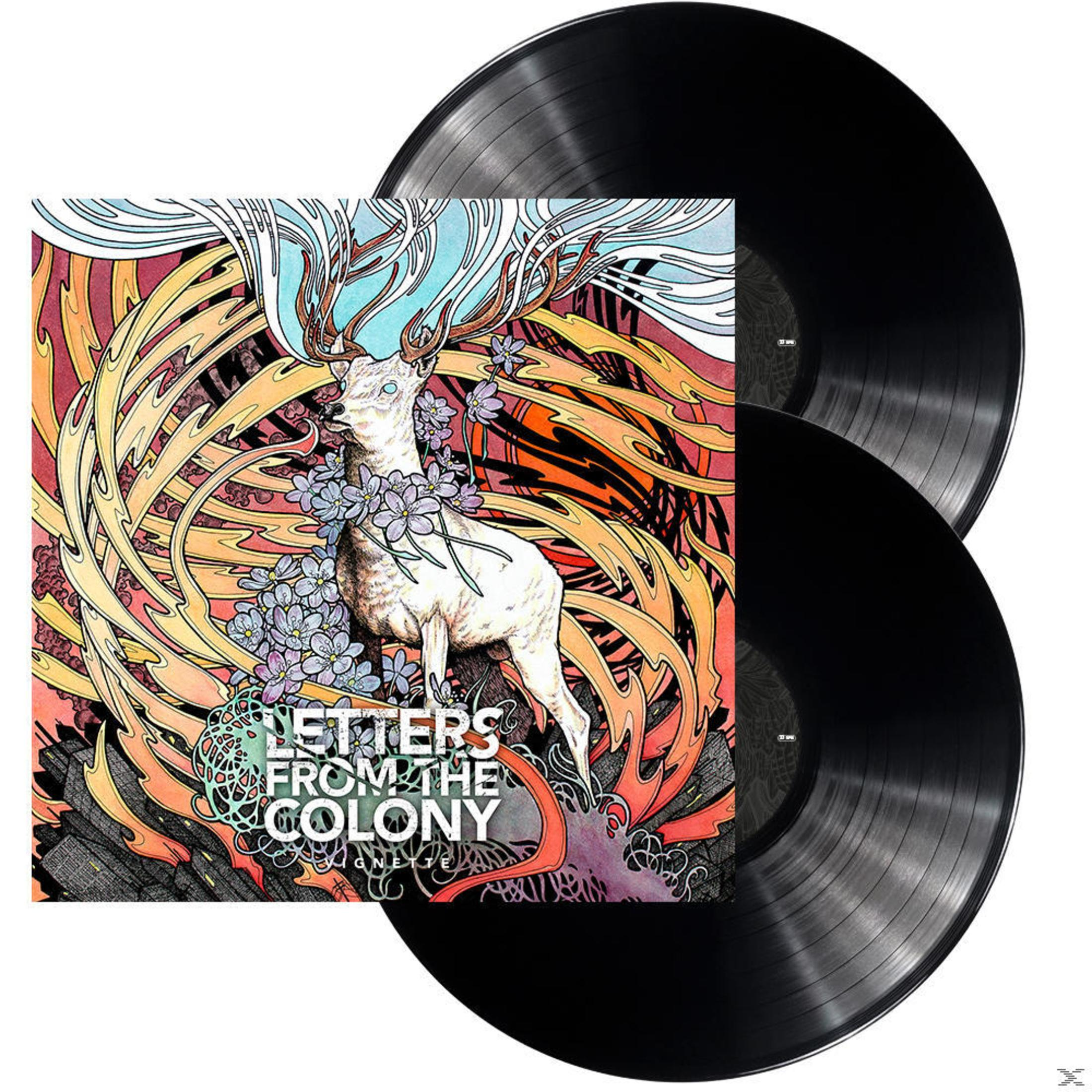 Zwei schwarze Schallplatten mit einem Cover, das einen weißen Hirschen zeigt, umgeben von Blumen und bunten Flammen.