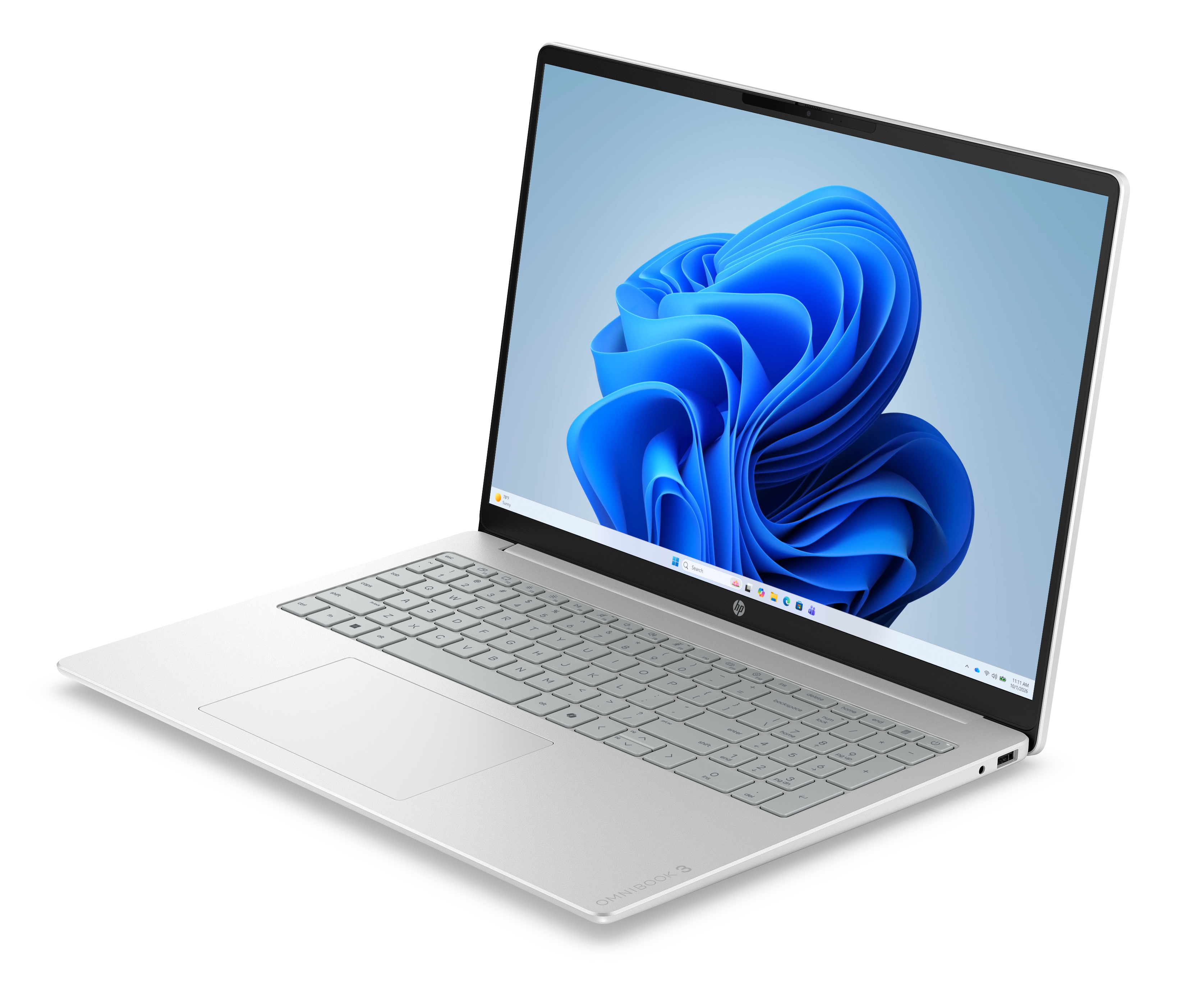 Un laptop HP argentato aperto su superficie bianca, con uno sfondo astratto blu vibrante sullo schermo.