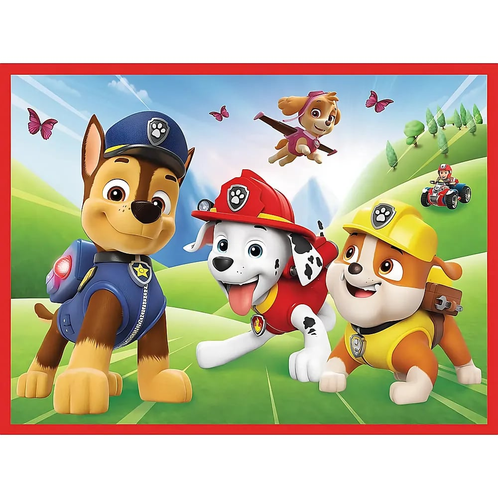 Los personajes de Paw Patrol Chase, Marshall, Rubble y Skye sonriendo felices en un paisaje verde.