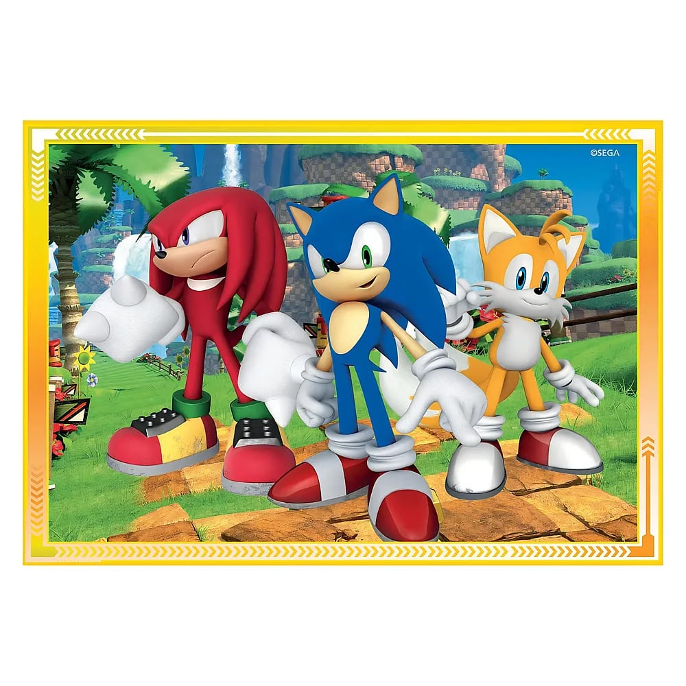 Sonic, Knuckles y Tails se encuentran en un paisaje verde con caminos.