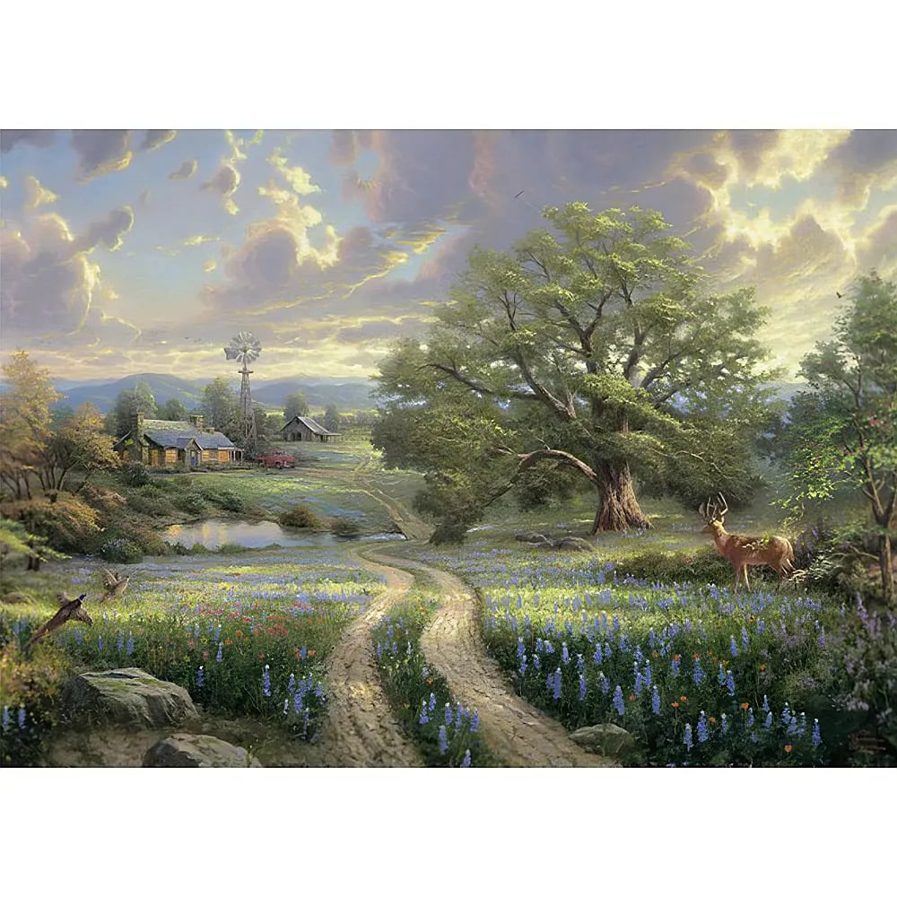 Landschaft mit blauem Himmel, grossem Baum, blühenden Wiesen, Farm im Hintergrund und Hirsch auf der rechten Seite.