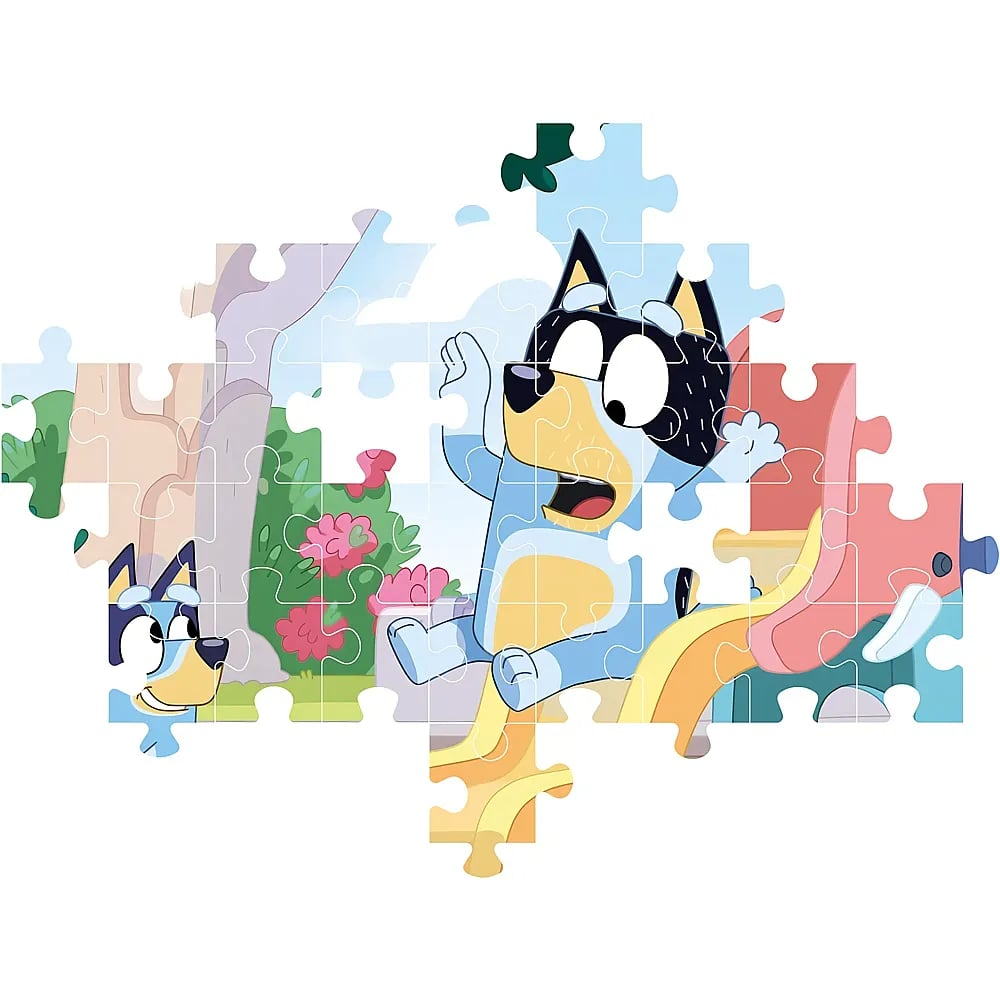 Un rompecabezas incompleto que muestra a Bluey y Bingo jugando al aire libre.